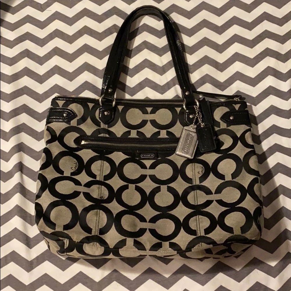 Grey and black coach purse